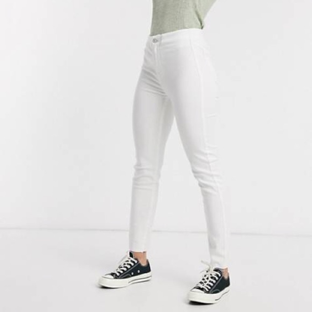 White high-waisted skinny jeans